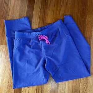 Vibrant purple Livingston scrub bottoms with Pink drawstring